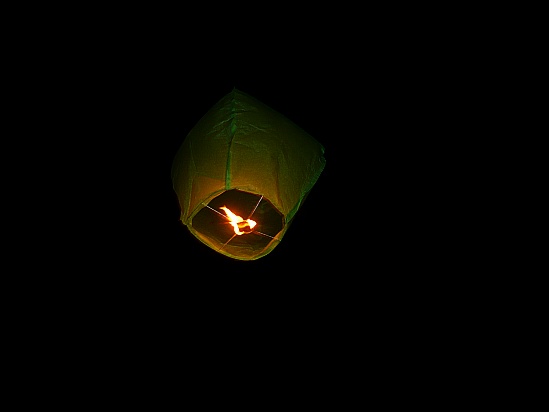 Floating kite with flame - Public Domain Photograph