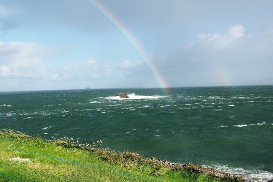 Rainbow in sea - Public Domain Photograph