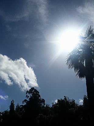 Sunlight with clouds in blue sky - Public Domain Photograph
