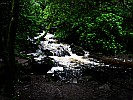 waterfall-and-rapids-in-small-river